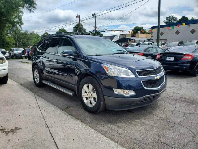 2012 Chevrolet Traverse for sale at DAGO'S AUTO SALES LLC in Dalton, GA