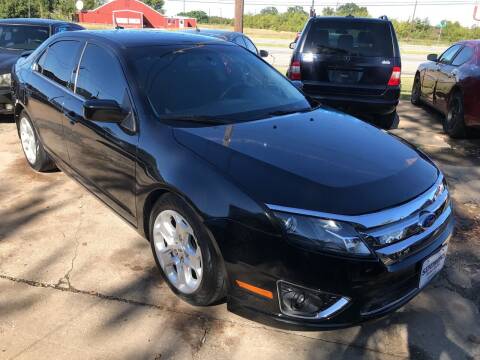 2011 Ford Fusion for sale at Simmons Auto Sales in Denison TX