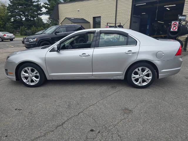 2012 Ford Fusion for sale at QUEENSGATE AUTO SALES in York, PA