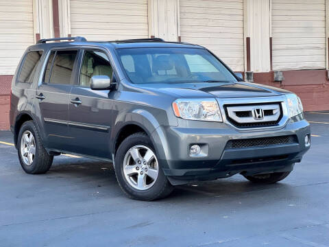 2009 Honda Pilot for sale at EASYCAR GROUP in Orlando FL