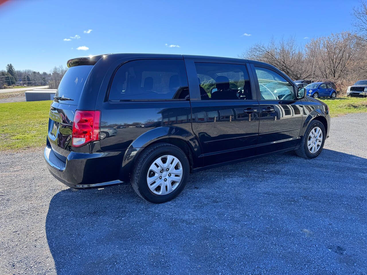 2015 Dodge Grand Caravan for sale at Riverside Motors in Glenfield, NY