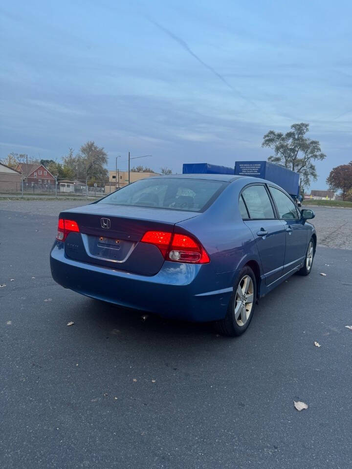 2006 Honda Civic for sale at H & H AUTO GROUP in Detroit, MI