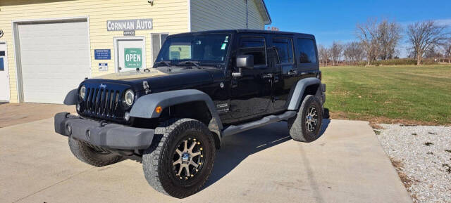 2014 Jeep Wrangler Unlimited for sale at CORNMAN AUTO LLC in Kirksville, MO