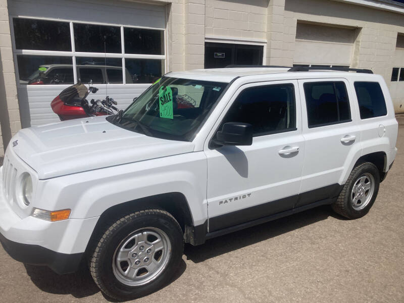 2014 Jeep Patriot for sale at Ogden Auto Sales LLC in Spencerport NY