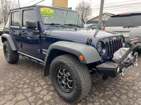 2013 Jeep Wrangler Unlimited for sale at MEDINA WHOLESALE LLC in Wadsworth OH