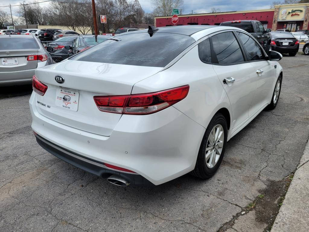 2016 Kia Optima for sale at DAGO'S AUTO SALES LLC in Dalton, GA