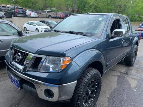 2014 Nissan Frontier for sale at J & M Automotive in Naugatuck CT