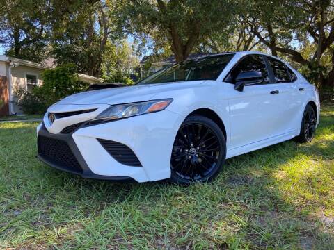 2019 Toyota Camry for sale at LATINOS MOTOR OF ORLANDO in Orlando FL