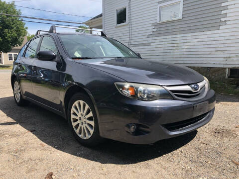 2011 Subaru Impreza for sale at Specialty Auto Inc in Hanson MA