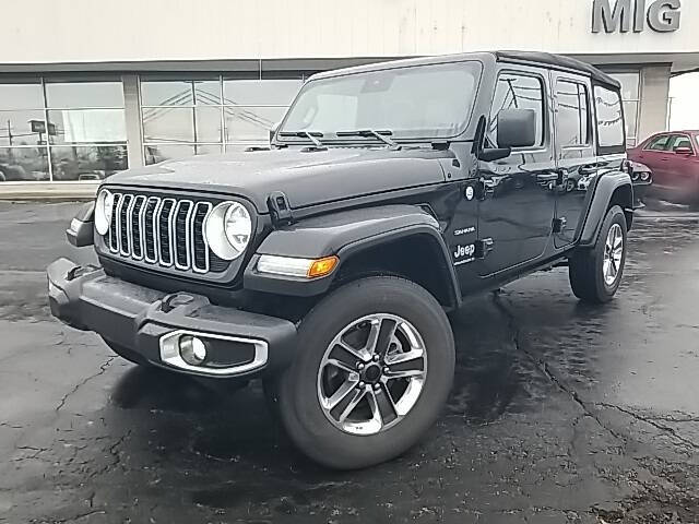 Used 2024 Jeep Wrangler 4-Door Sahara with VIN 1C4PJXENXRW100660 for sale in Bellefontaine, OH