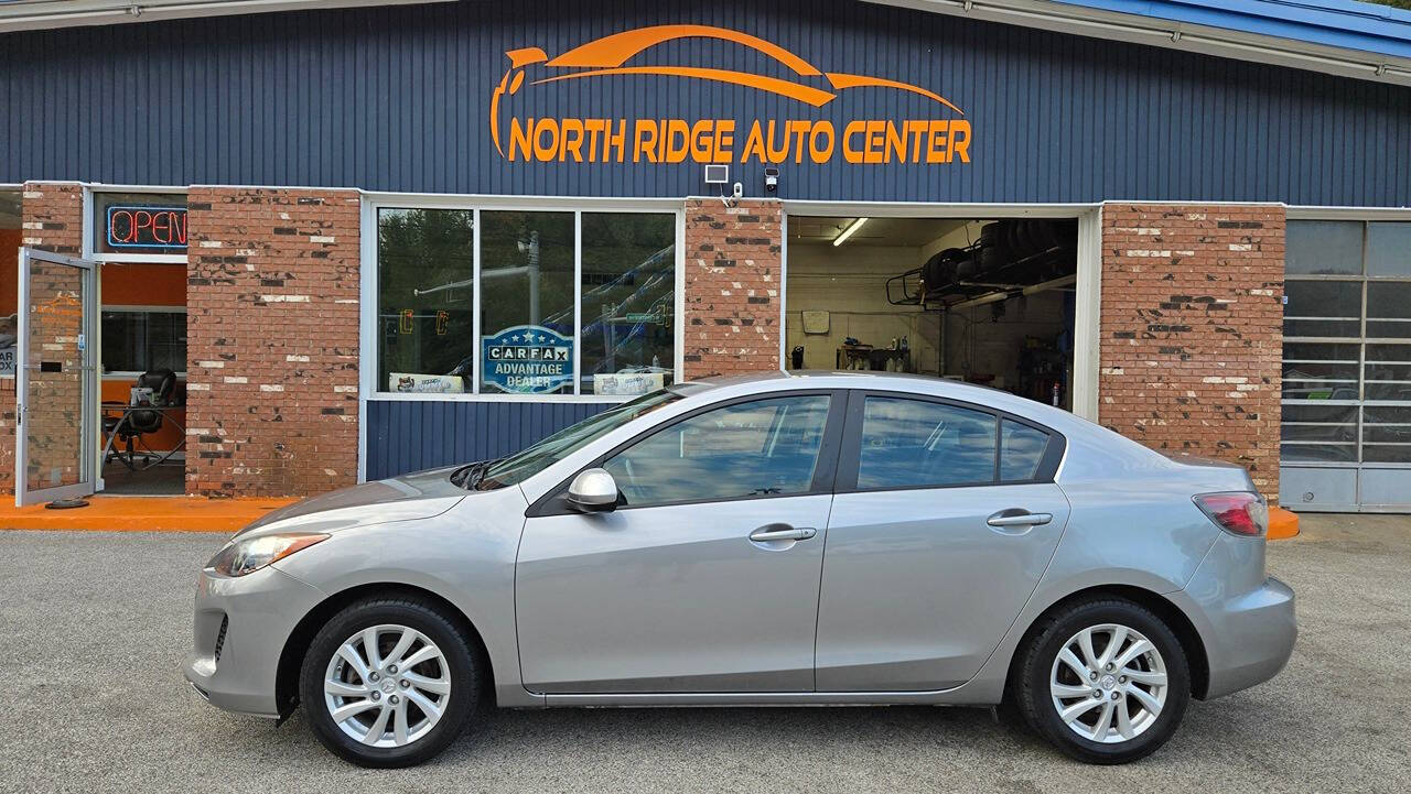 2012 Mazda Mazda3 for sale at North Ridge Auto Center LLC in Madison, OH