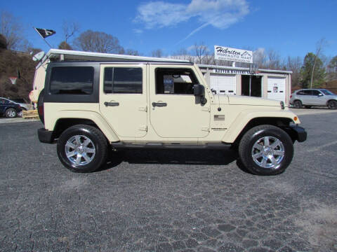 2011 Jeep Wrangler Unlimited for sale at Hibriten Auto Mart in Lenoir NC