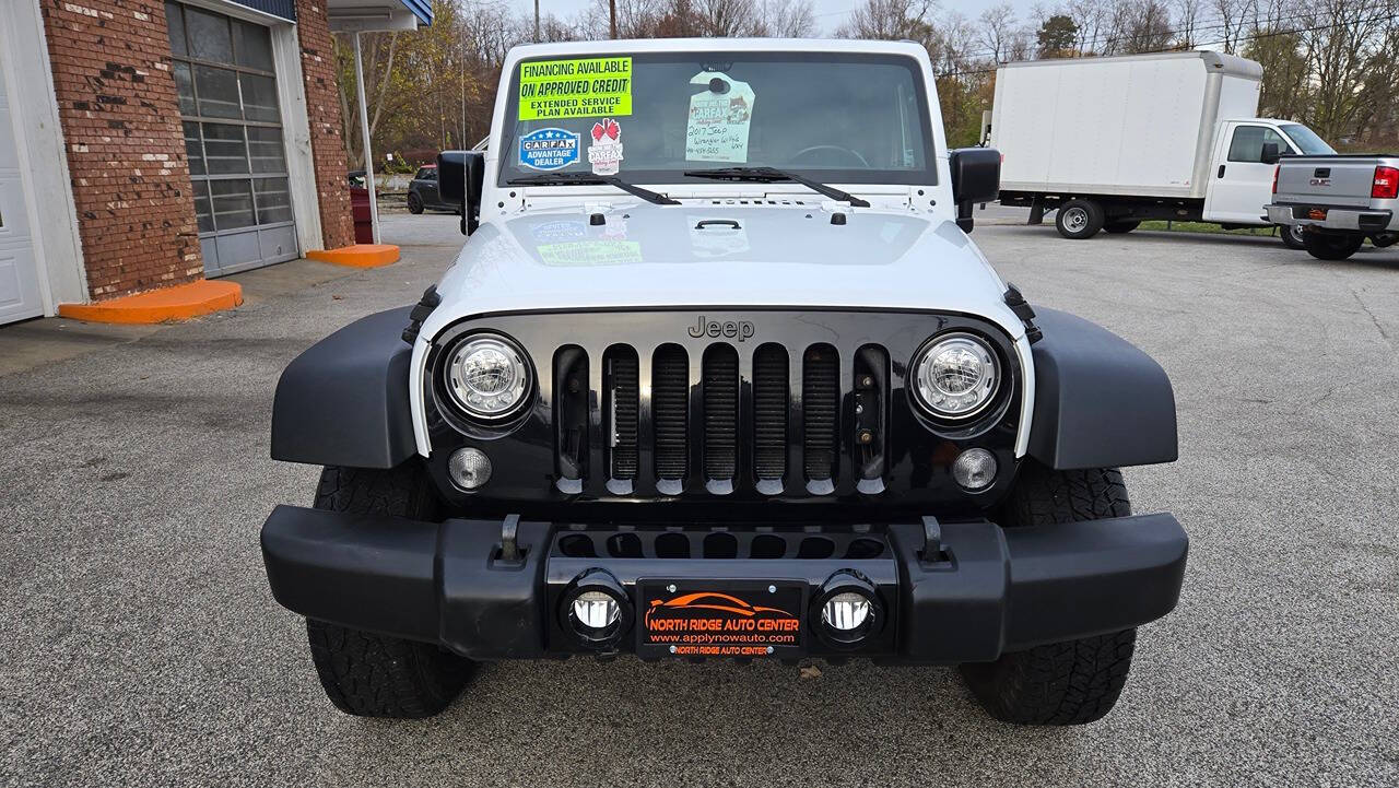 2017 Jeep Wrangler Unlimited for sale at North Ridge Auto Center LLC in Madison, OH