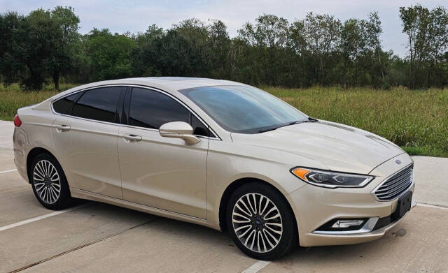 2018 Ford Fusion for sale at CAR MARKET AUTO GROUP in Sugar Land, TX