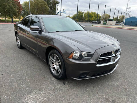 2014 Dodge Charger for sale at R&A Auto Sales, inc. in Sacramento CA