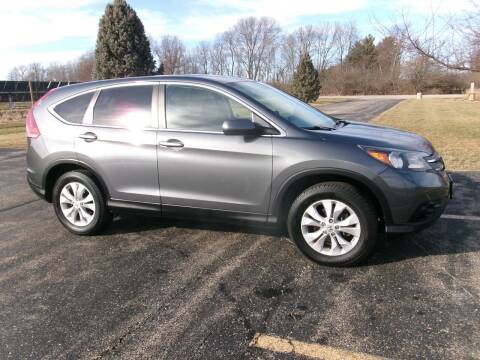 2013 Honda CR-V for sale at Crossroads Used Cars Inc. in Tremont IL