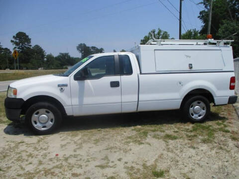 2008 Ford F150 Pickup with Work Topper a