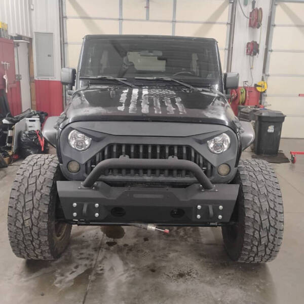 2011 Jeep Wrangler Unlimited for sale at Scott Sales & Service LLC in Brownstown IN