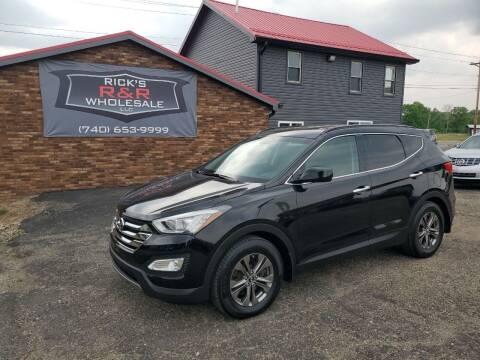 2014 Hyundai Santa Fe Sport for sale at Rick's R & R Wholesale, LLC in Lancaster OH