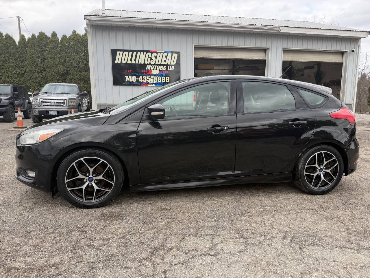 Black 2015 Ford Focus SE SE 4dr Hatchback 1