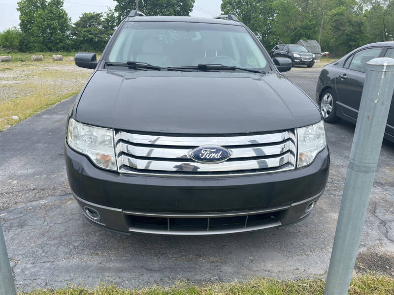 2008 Ford Taurus X for sale at HEDGES USED CARS in Carleton MI