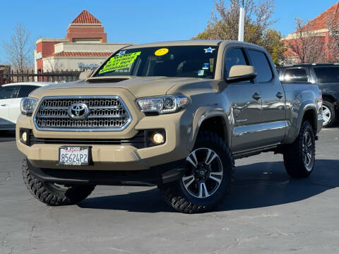 2017 Toyota Tacoma for sale at Lugo Auto Group in Sacramento CA