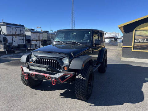 2013 Jeep Wrangler for sale at BELOW BOOK AUTO SALES in Idaho Falls ID