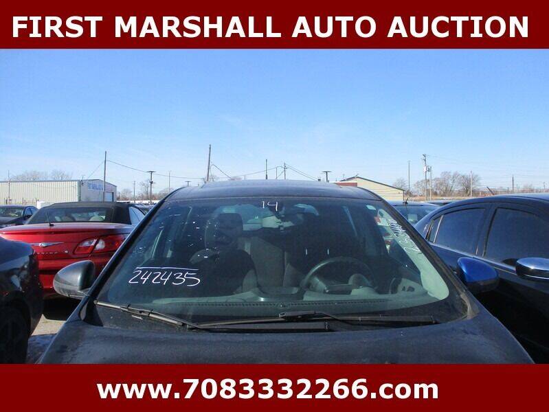 2014 Chevrolet Sonic for sale at First Marshall Auto Auction in Harvey IL