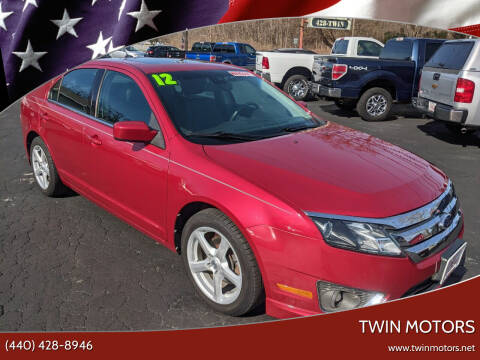 2012 Ford Fusion for sale at TWIN MOTORS in Madison OH