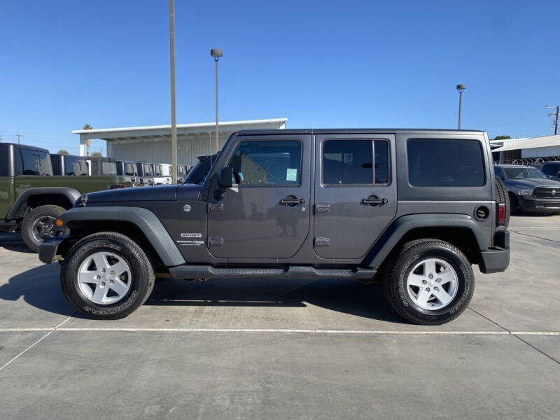 Used 2018 Jeep Wrangler JK Unlimited Sport S with VIN 1C4BJWDG3JL926831 for sale in Peoria, AZ