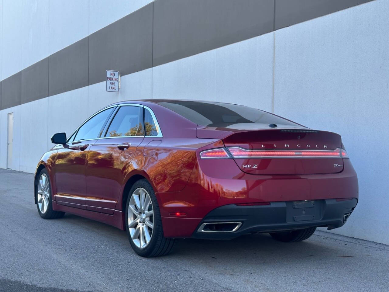 2015 Lincoln MKZ for sale at Phoenix Motor Co in Romulus, MI