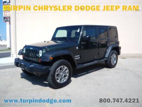 2012 Jeep Wrangler Unlimited for sale at Turpin Chrysler Dodge Jeep Ram in Dubuque IA