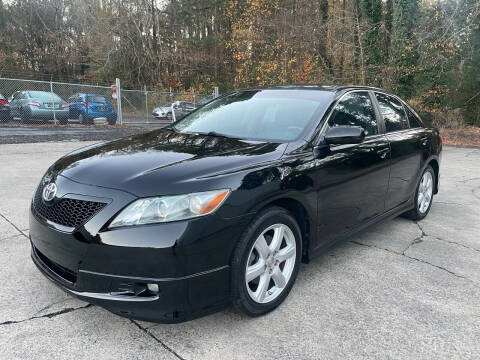 2009 Toyota Camry for sale at Legacy Motor Sales in Norcross GA