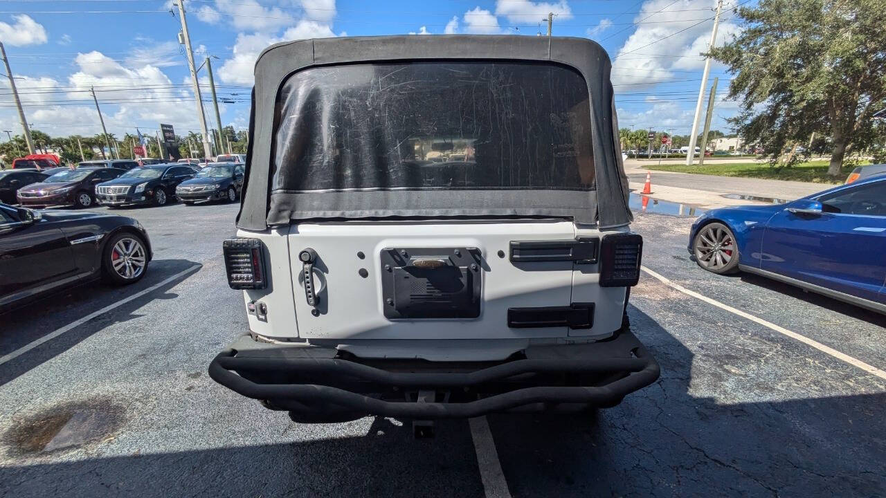 2014 Jeep Wrangler Unlimited for sale at Celebrity Auto Sales in Fort Pierce, FL