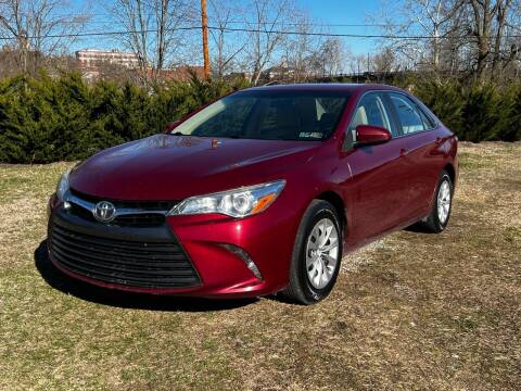 2015 Toyota Camry for sale at PUTNAM AUTO SALES INC in Marietta OH
