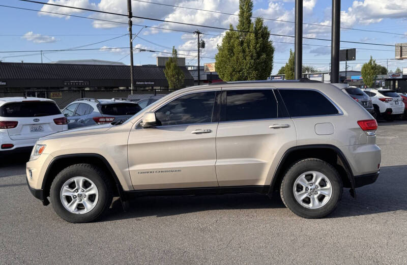 Used 2014 Jeep Grand Cherokee Laredo with VIN 1C4RJFAG8EC226568 for sale in Spokane, WA