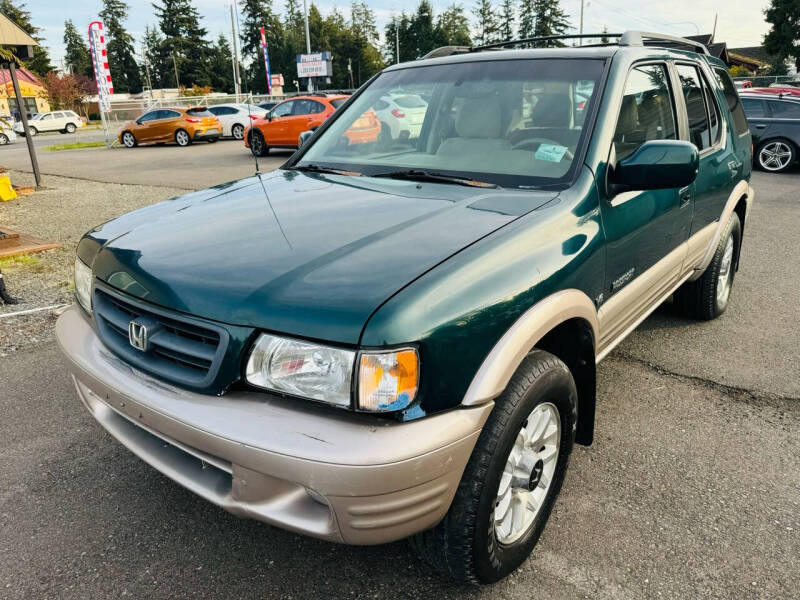 Used 2000 Honda Passport LX with VIN 4S6DM58W2Y4405666 for sale in Tacoma, WA