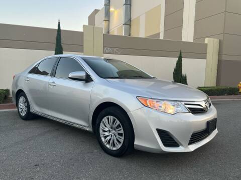 2014 Toyota Camry for sale at Chico Autos in Ontario CA