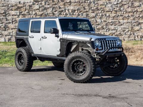 2012 Jeep Wrangler Unlimited for sale at Car Hunters LLC in Mount Juliet TN