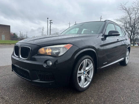 2014 BMW X1 for sale at Minnix Auto Sales LLC in Cuyahoga Falls OH