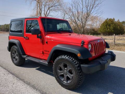 2017 Jeep Wrangler for sale at Village Car Company in Hinesburg VT