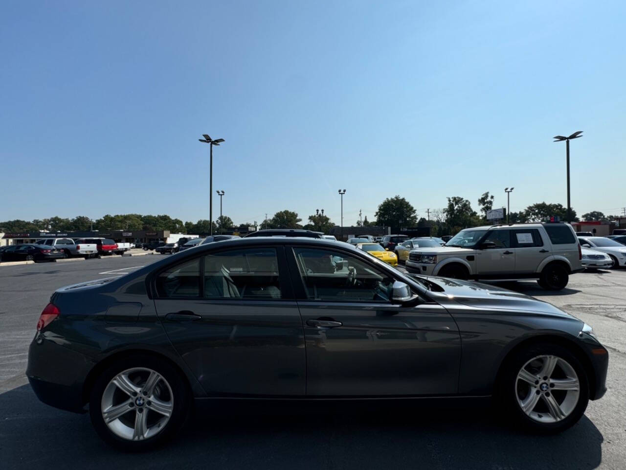 2013 BMW 3 Series for sale at Opus Motorcars in Utica, MI