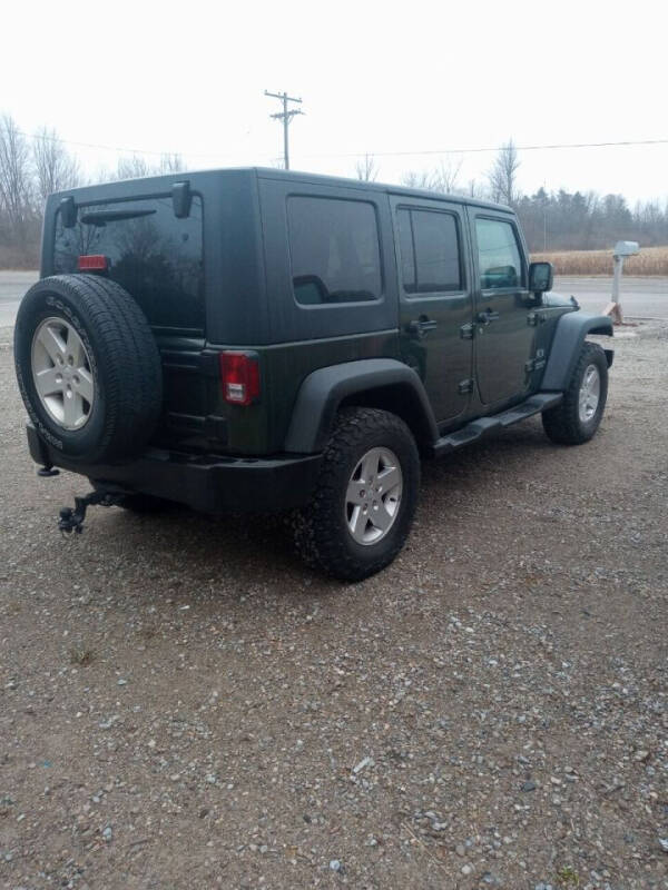 2009 Jeep Wrangler Unlimited for sale at Mobile-tronics Auto Sales in Avoca MI