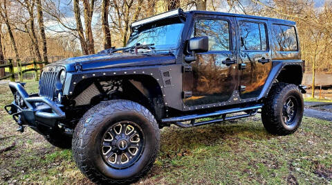 2015 Jeep Wrangler Unlimited for sale at GOLDEN RULE AUTO in Newark OH