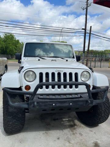 2012 Jeep Wrangler Unlimited for sale at ALPHA AUTO CENTER in Houston TX