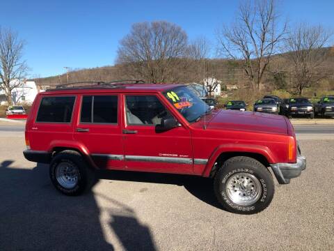 1999 Jeep Cherokee for sale at George's Used Cars Inc in Orbisonia PA
