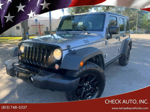 2014 Jeep Wrangler Unlimited for sale at CHECK AUTO, INC. in Tampa FL