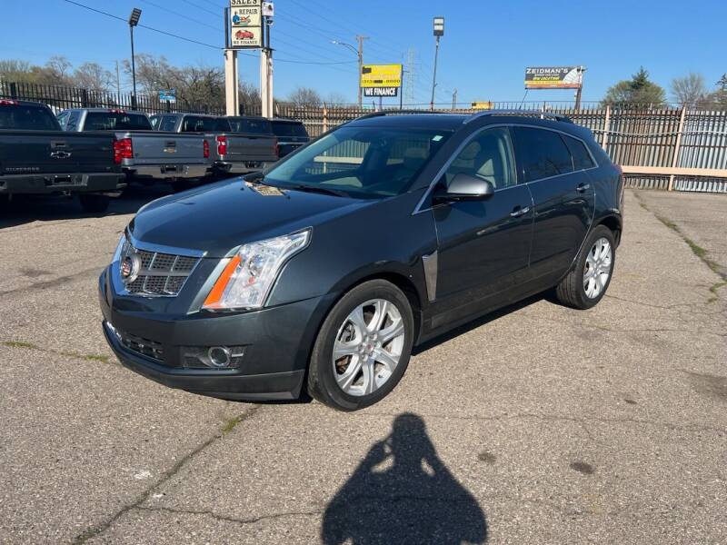 Used 2013 Cadillac SRX Performance Collection with VIN 3GYFNHE38DS577817 for sale in Detroit, MI