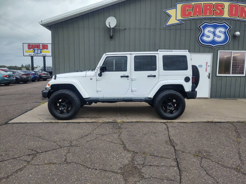2014 Jeep Wrangler Unlimited for sale at CARS ON SS in Rice Lake WI