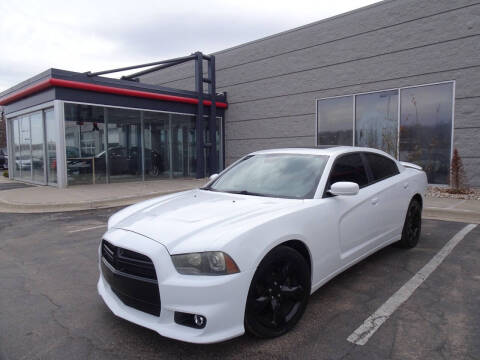 2014 Dodge Charger for sale at RED LINE AUTO LLC in Bellevue NE